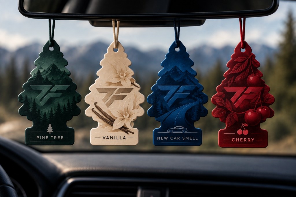 Pine, vanilla, new car, and cherry scent trees hanging in a car